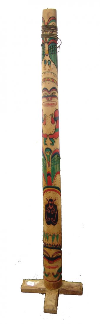 Nuu-Chah-Nulth Totem: Ca. 1930s, Unique vintage hand carved alderwood totem pole loaded with mythological figures on an unfinished surface. Very good condition. Collected in Centralia, Washington, pre-1950s. 63" tall (15" 
