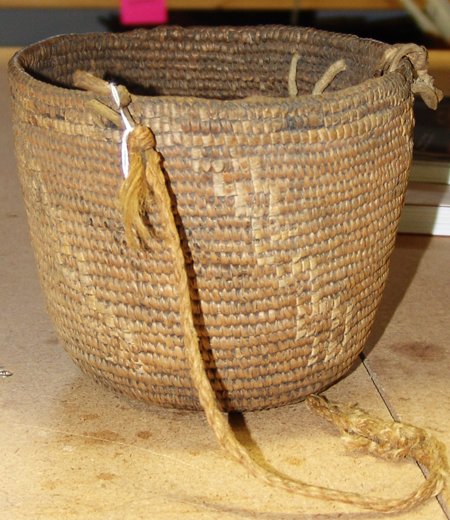 Klickitat Basket: Late 1800s, Classic old hard-sided cooking basket with faded imbricated designs. Sturdy and intact. Very good condition for its age. 6" x 7-3/4"