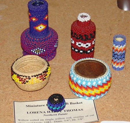Box Lot of Beaded Baskets and Bottles: Various Ages, Includes two baskets (the smaller by Lorena Happy Thomas), two bottles, a napkin ring, and a small vial. All in very good condition. 5/8" x 3/4" to 3" x 1-3/4"