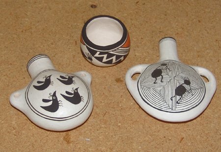 Box Lot - Lucy Lewis Family Potters: Varioius Ages, The small jar by Lucy, an ant canteen by Emma, and the other by Dolores. All in very good condition. 1-7/8" x 2-1/8" to 4-1/2" x 4" x 1-1/2"