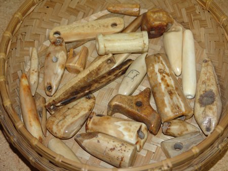 Box Lot of Ivory Relics: Various Ages, Some great old excavated pieces made from fossilized ivory, a few are bone. Basket 4-1/2" x 10"