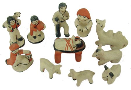 Cochiti Pottery Nativity Set - Seferina Ortiz: Ca. 1970s, Traditional hand formed and painted pottery scene (eleven piece) includes: baby in manger, Mary, Joseph, the Three Wise Men, camel, burro, cow, and two lambs. All in very good condition. Ma