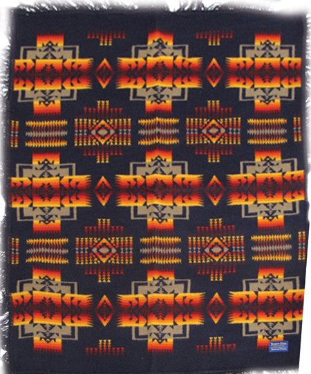 Pendleton Blanket: Late 1900s, Vintage Beaver State labeled Pendleton shawl done in a variety of colors on a navy ground. Good condition. 68" x 68"
