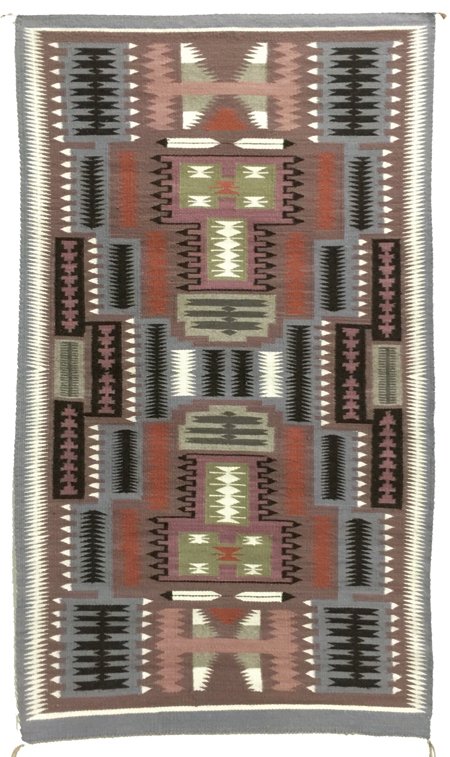 Navajo Rug/Weaving: Ca. 1970s, Stunning tightly woven storm patterned rug with various elements, feathers, and serrated diamonds. Great condition. 4' 9" x 2' 7"