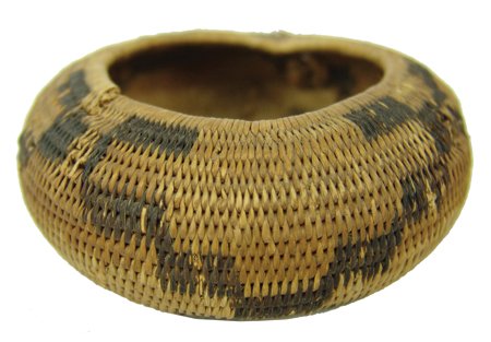 Pomo Basket: Early 1900s, Very fine weave single miniature bowl with repeating stepped design. Front three-quarters in very good condition, but has breakage on the back. 1-1/8" x 2-3/4"