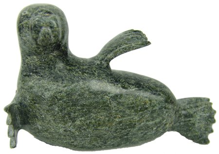 Eskimo Soapstone Carving: Ca. 1970s, Hand carved green soapstone seal, marked Peter Rogee. Very good condition. 4" x 7" x 1-3/4"