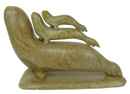 Eskimo Soapstone Carving: Ca. 1980s, Hand carved green soapstone mother seal and her pups, unsigned. Good condition, her pups have been reattached. 4-1/2" x 6-1/2" x 2-1/2"