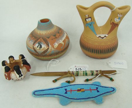 Box Lot of Miscellaneous Indian Material: Various Ages, Includes two Navajo sgraffitto pots, a more recent beaded lizard fetish, an older quilled stick-game stick, and a small Jemez friendship pot by Anita Catero. All in very good condition.