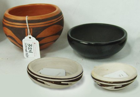 Box Lot of Pottery: Various Ages, Includes a Hopi bowl by Frieda Poleaha, a small Santa Clara/San Ildefonso black bowl, and two small Hopi bowls with claw hallmarks. All in very good condition. Red pot 3-1/2" x 5