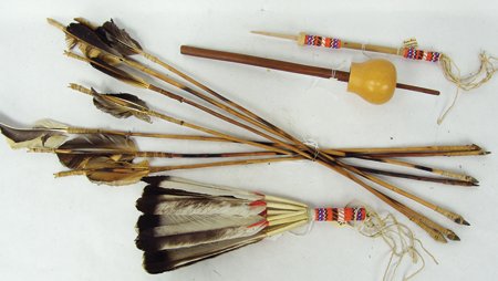 Box Lot of Southern Plains Items: Various Ages, Includes seven arrows with buckskin lashed arrows and (painted) feather fletching, matching Peyote (painted) feather fan, rattle handle, plus another plain gourd rattle. Good condition.