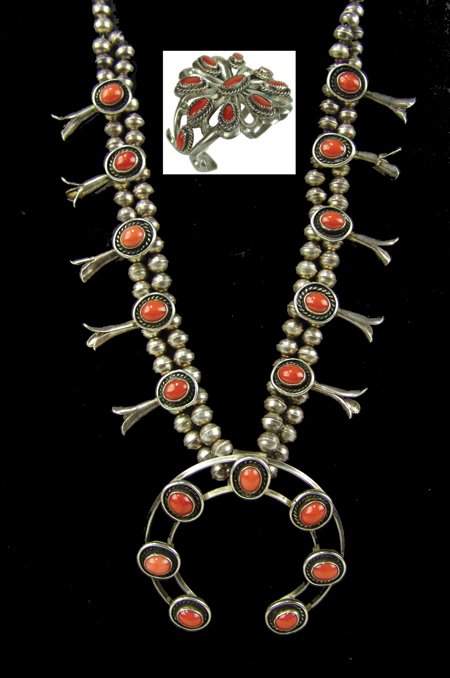 Navajo Necklace Set: Ca. 1970s, Includes a "squash blossom" necklace and a sandcast rosette bracelet done in silver with oxblood red coral stones (bracelet 5-1/2" + 1-1/4" x 2-5/8"). These have always been together as a s