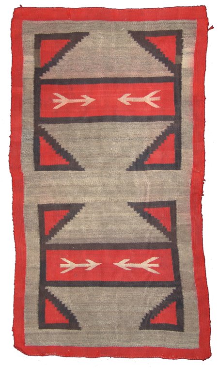 Navajo Rug/Weaving: Ca. 1940, Smaller Ganado child's double saddle blanket with arrow symbols. Good condition, minor edge erosion and some bleed. 26" x 47"