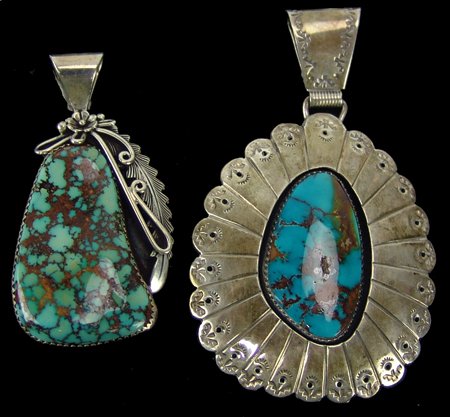 2 Navajo Pendants - Peterson Johnson: Late 1900s, Pair of silver and turquoise pendants, the smaller with natural Kingman by Johnson, the other a shadow box version with high quality Hachita turquoise, signed "E" (Ella Cowboy(?)). Very go