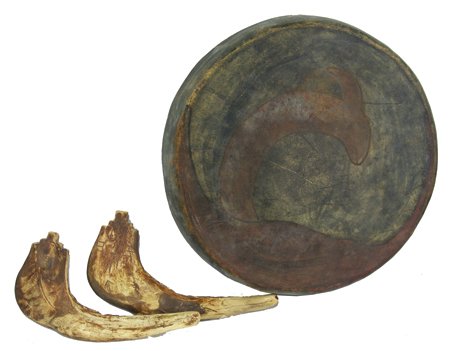 2 Pueblo Items: Mid/Late 1900s, Includes an early trimmed, shaped, and painted rawhide drum head with Avanyu serpent figure, and two jaw bone clubs with carved sun symbols. Both in very good condition. Drum 2-1/2" x 
