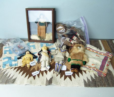 Collection of Dolls: Various Ages, Fine collection of Indian items including many dolls: a small Navajo serrated shelf rug in all-natural homespun wool, 41" x 20"; a vintage whirling log or swastika doll quilt, tag reads