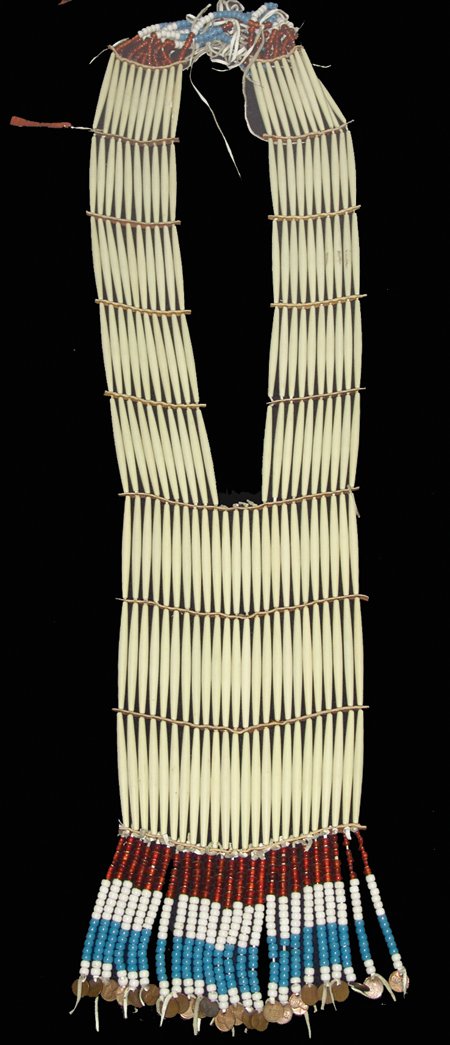 Sioux Breastplate Necklace - Eli Bear Shield: Ca. 1970s, Long and graceful front piece made from 4" composite "bone" hair pipe with leather spacers and colorful glass beads. 47" x 9-1/2"
