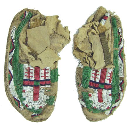Cheyenne Beaded Moccasins: Ca. 1900, Classic pair of sinew sewn and lazy stitch beaded hard soled moccasins with only partial beadwork remaining. Poor condition. 9"