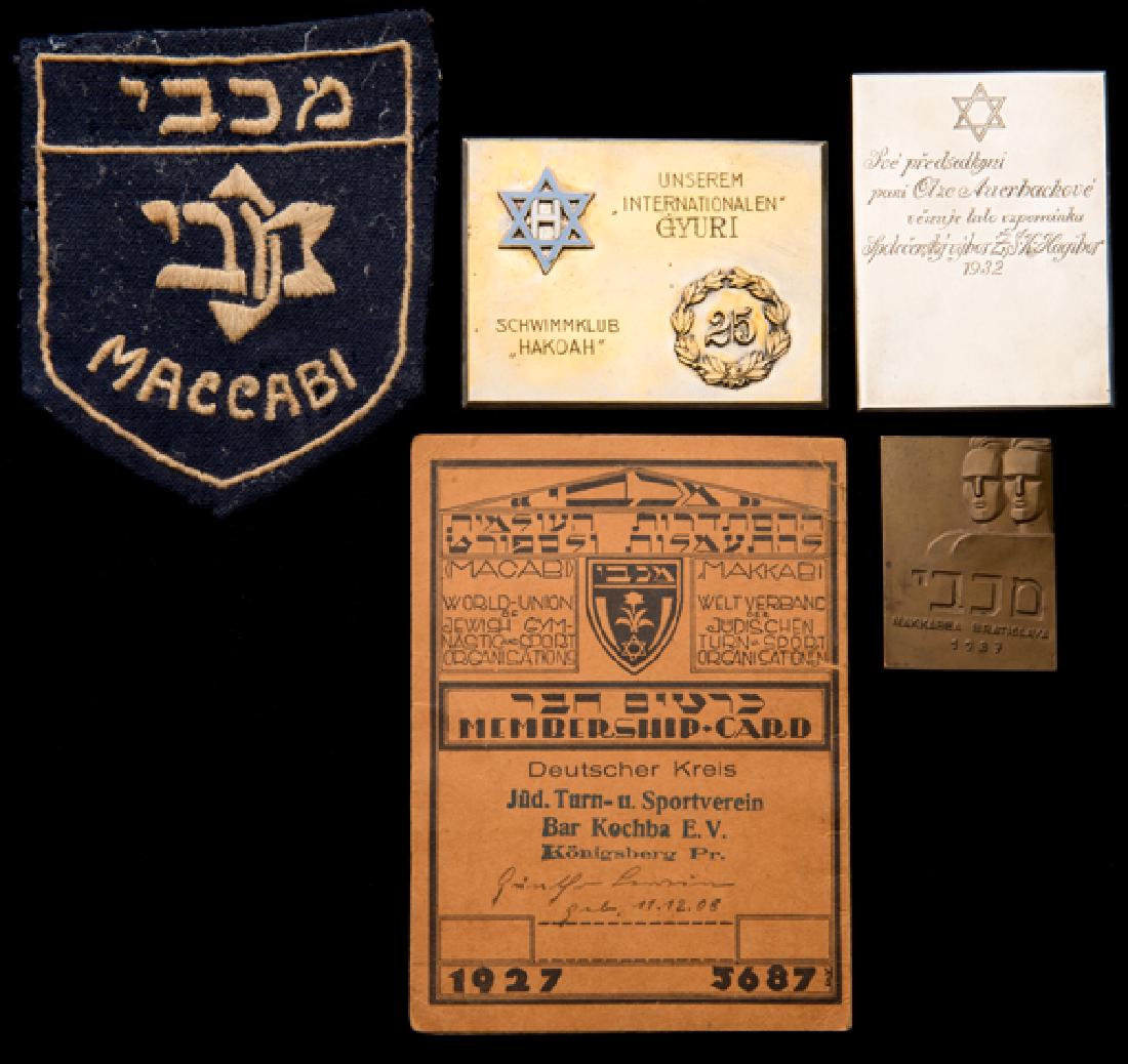 A collection of Jewish sports medals and memorabilia,: A collection of Jewish sports medals and memorabilia, comprising: i) a 1932 Z.S.K. (Zidovsky Sportovni Klub) Hagibor Prague, Czechoslovakia, sterling silver medal plaque presented to Olga Auerbach (19