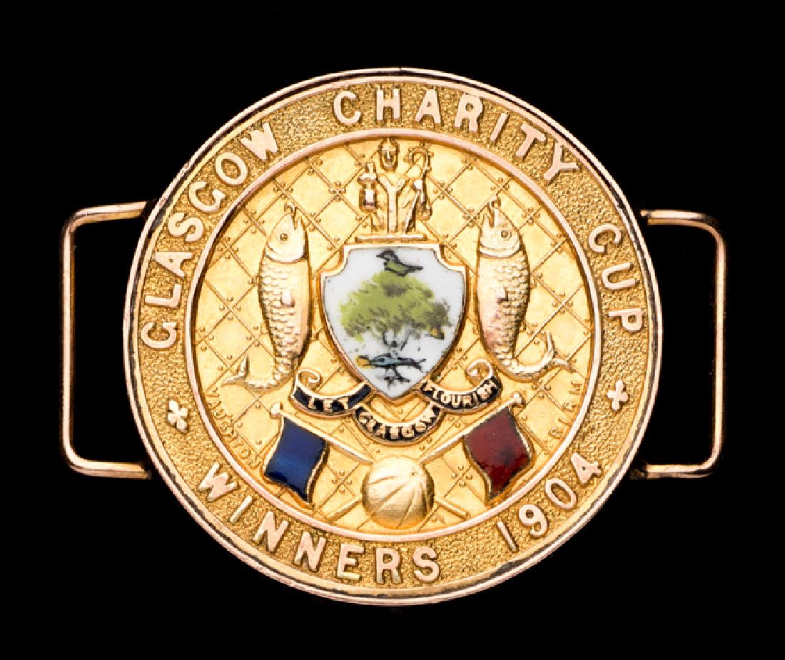 9ct. gold & enamel Glasgow Charity Cup medal awarded to: 9ct. gold & enamel Glasgow Charity Cup medal awarded to James Stark of Rangers FC in 1904, inscribed with details, later side links applied James Stark was a centre-half who joined Glasgow Rangers in