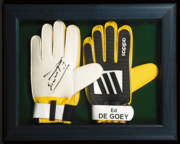 Three pairs of signed gloves from international go: Three pairs of signed gloves from international goalkeepers, comprising signed pairs from Ed de Goey (Holland), Matt Poom (Estonia) & Craig Forrest (Canada), all mounted, framed & glazed (3)