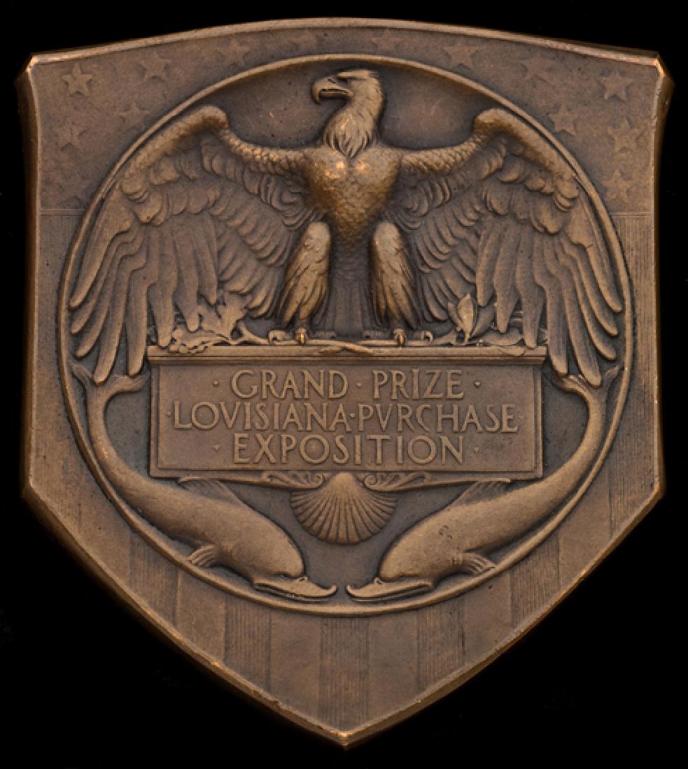 Grand Prize Medal of the Louisiana Purchase Exposition: Grand Prize Medal of the Louisiana Purchase Exposition 1904, Triangular, bronze, 70mm., by Weinberg, Louisiana cloaking Indian maiden, reverse Eagle with outspread wings on panel with award legend The