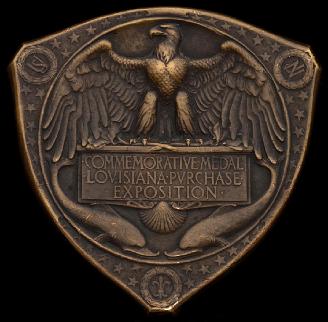 Commemorative Medal of the Louisiana Purchase: Commemorative Medal of the Louisiana Purchase Exposition 1904, Triangular, bronze, 70mm., by Weinberg, Louisiana cloaking Indian maiden, reverse Eagle with outspread wings on panel with award legend T