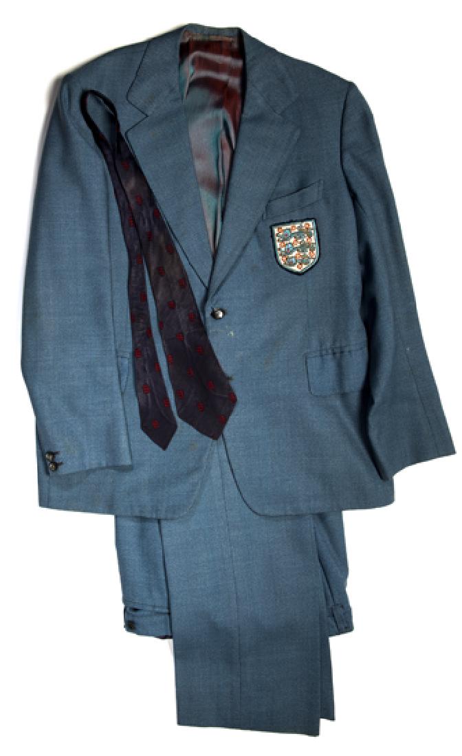 Joe Mercer's England manager's suit 1974, light-blue: Joe Mercer's England manager's suit 1974, light-blue wool 2-piece suit by Gino of Coventry, three lions badge to breast pocket, two-tone lining; sold with a F.A. neck tie (3)