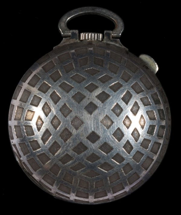 A Swiss white metal golf ball pocket watch circa 1: A Swiss white metal golf ball pocket watch circa 1930, Brev. No. 107244, the case designed as a square mesh golf ball