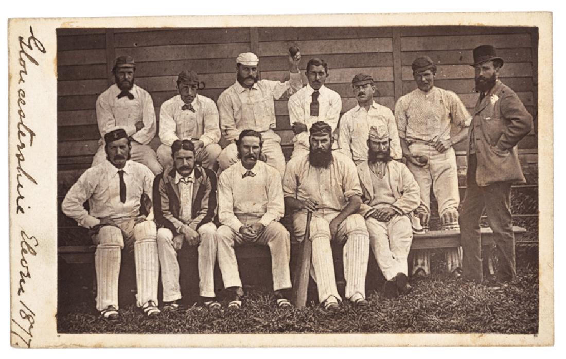 An early carte-de-visite sized photograph of the: An early carte-de-visite sized photograph of the Gloucestershire County Cricket team in 1877, including the 'three Graces' W.G., G.F. & E.M., Fairbanks, Monkland, Townshend, Capt. Kingscote etc.