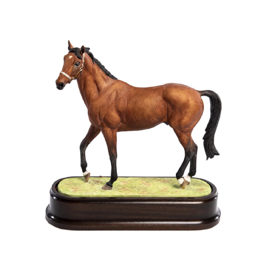 A Limited Edition Royal Worcester Nijinsky figurine by: A Limited Edition Royal Worcester Nijinsky figurine by Doris Lindner, circa 1972 modelled standing on a grassy base, raised upon a walnut oval plinth, bears factory marks and facsimile signature for D