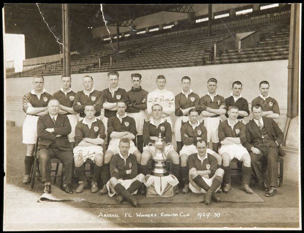 A fully-signed b&w team-group photograph of the Ar