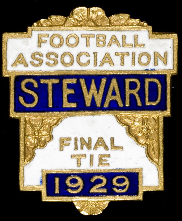 An enamelled badge worn by a Football Association
