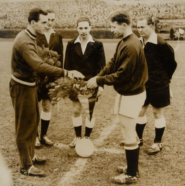 A group of sixteen Busby Babes b&w press photograp
