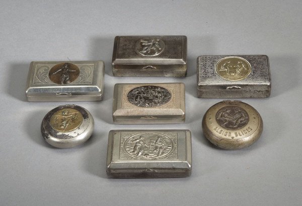 A group of seven continental metal boxes with foot