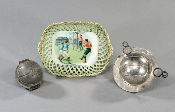 Two continental white metal chocolate moulds, both