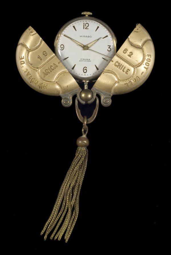 A group of four pocket watches with football decor
