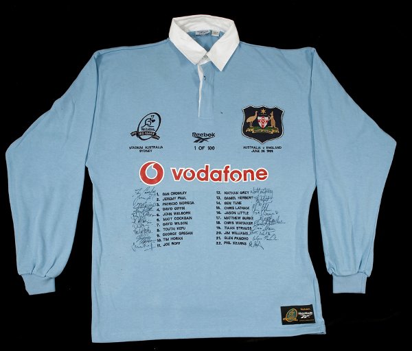 A pair of signed commemorative shirts for the Aus