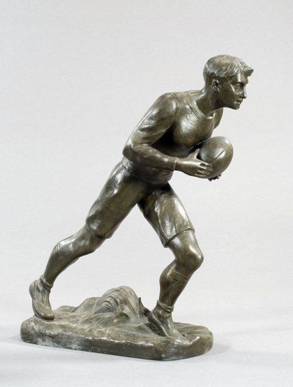 H Fugere RUGBY PLAYER signed, a spelter figure he