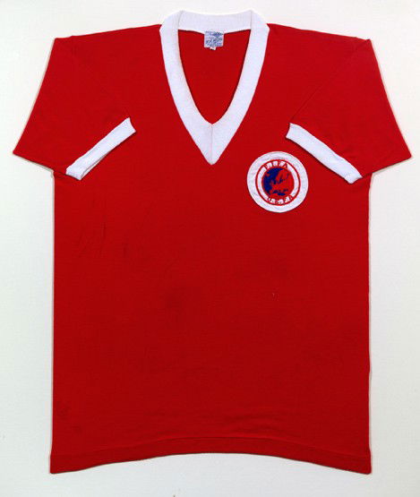 Jean Vincent's match-worn red Europe No.11 represe: Jean Vincent's match-worn red Europe No.11 representative jersey from the match v the United Kingdom played at Windsor Park 13th August 1955, with cloth badge inscribed FIFA/UEFA, mounted, framed & gl