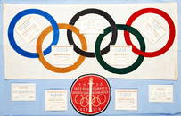 268: A 1936 Olympic Games display including an official