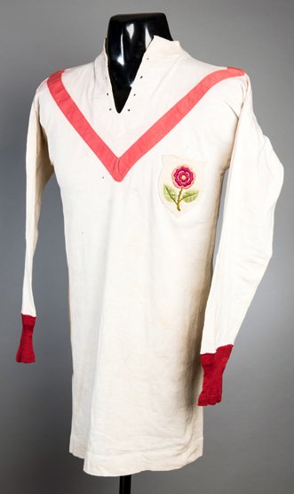 The shirt worn by the Manchester United captain Charlie: The shirt worn by the Manchester United captain Charlie Roberts during the club's first F.A. Cup Final appearance when they beat Bristol City 1-0 at the Crystal Palace 24th April 1909, white long-slee
