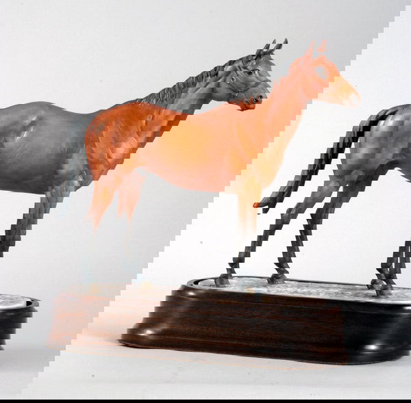 A Royal Worcester model of Red Rum, modelled by Do: A Royal Worcester model of Red Rum, modelled by Doris Lindner, a limited edition (152/250), with a wooden base and certificate (2)