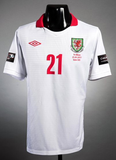Jack Collison: a white Wales No.21 international away: Jack Collison: a white Wales No.21 international away jersey 2010-11, short-sleeved, Carling Nations Cup badges, the reverse lettered COLLISON West Ham's Collison was an unused substitute in this Carl