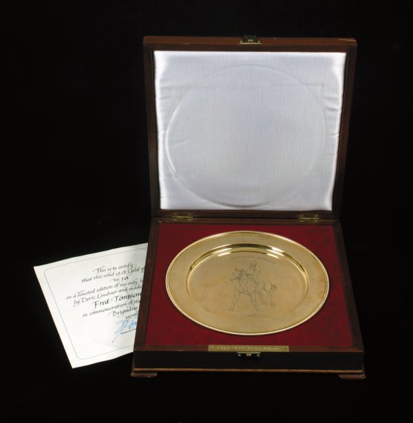An 18ct. gold plate commemorating the achievements: An 18ct. gold plate commemorating the achievements of the racehorse Brigadier Gerard, from a limited edition of 100 designed by Doris Lindner in 1972 for Crawford & Gilbey Limited, this example number