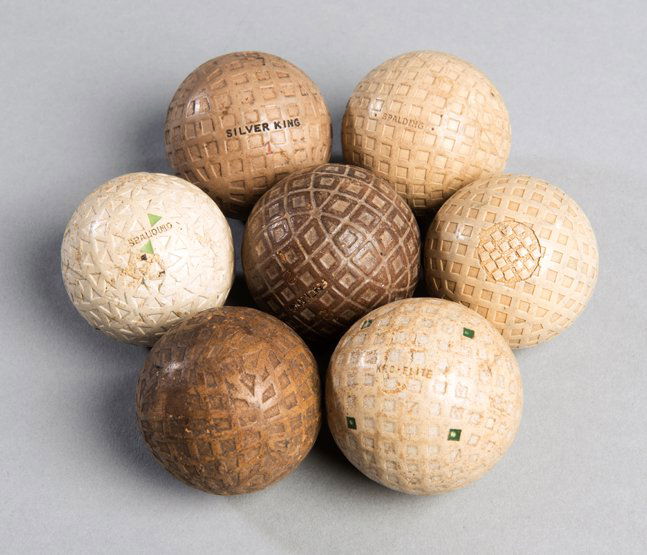 Seven golf balls. including a Super Harlequin (1 of 1)