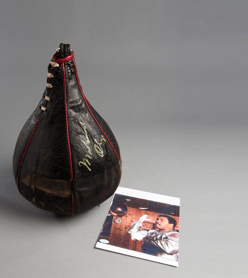 Muhammad Ali used and signed Everlast speed bag from: Muhammad Ali used and signed Everlast speed bag from his training camp in Deer Lake, Pennsylvania while preparing for the Larry Holmes fight in 1980, an historical item dating towards the conclusion o