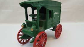 VINTAGE GREEN CAST IRON MILK TRUCK (1 of 4)