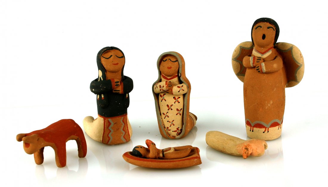 6 piece Jemez Nativity Scene by Juanita: Southwestern pottery example with Joseph, Mary, Jesus, the Angel, and two animals. All in a buff clay and hand painted. Signed 'Juanita'. We believe this to be the work of Juanita Martinez of Taos Pue