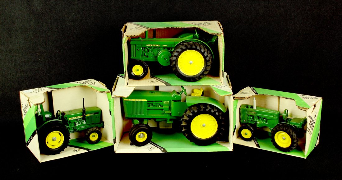 4 Toy John Deer Tractors NIB by Ertl: Nice assortment of 1/16th scale toys new in their original boxes. Ertl #'s 540, 581, 544, 555. John Deere models 'M', 'R', 'Compact Utility', and '5020' From the Nick Hadden Collection of Vintage Toys