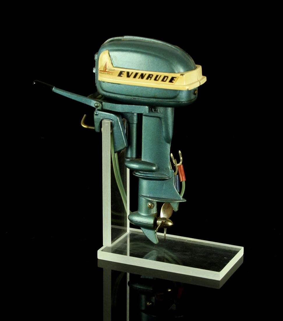 Vintage 1955 K&O Evinrude 25 HP 'Big Twin Aquasonic': Incredible metallic blue paint model outboard motor with 'Whispering Power' Original Paint in VG+ condition. Includes Lucite Stand. From the Nick Hadden Vintage Toy & Model Collection